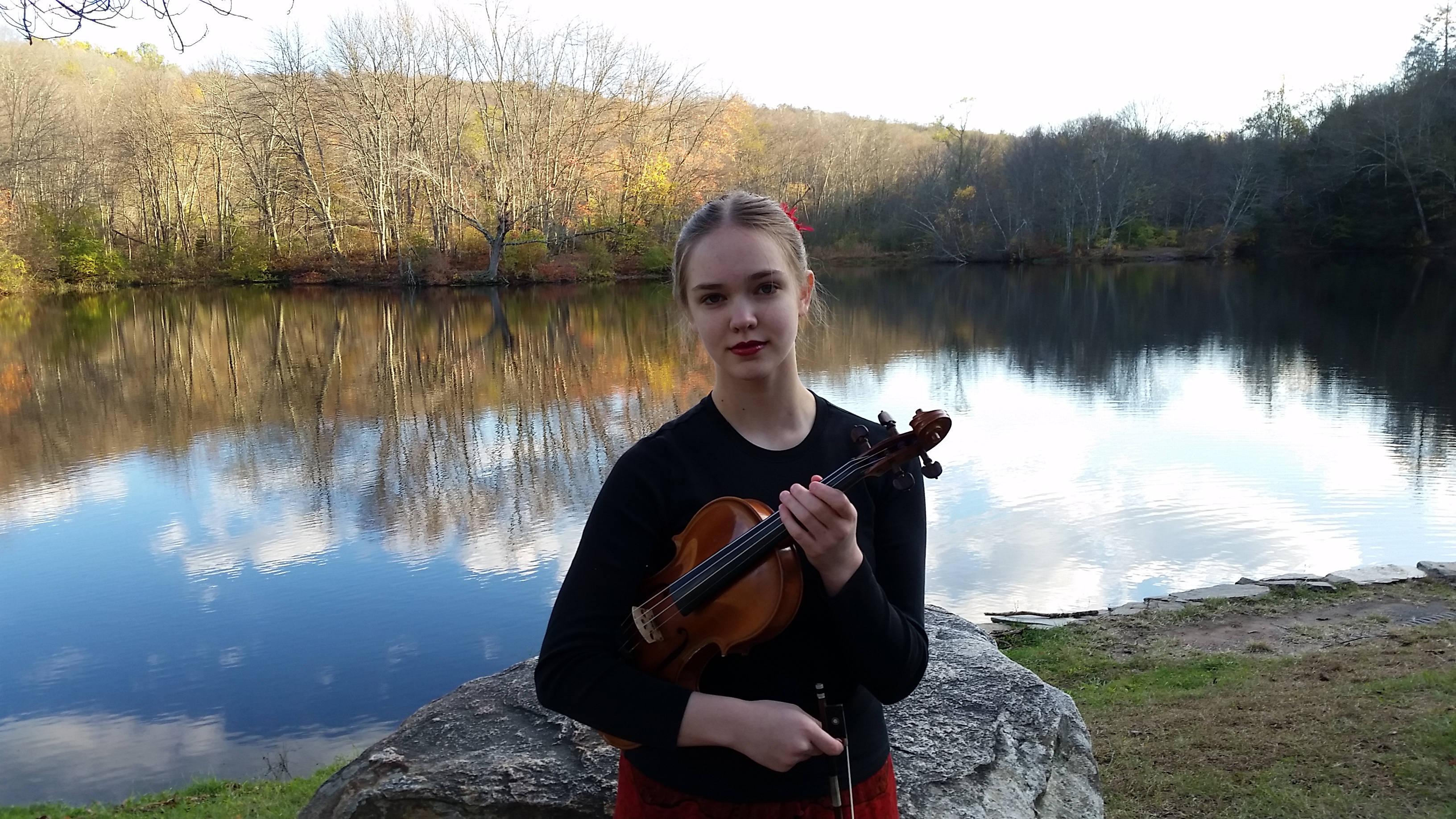 Rebecca holding her violin